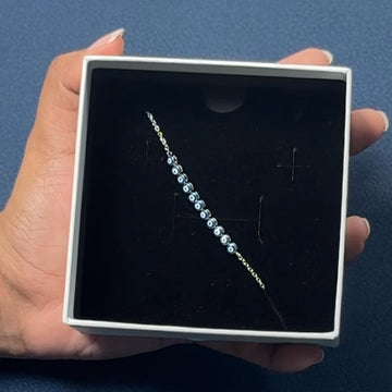 Day 11 – Tennis Evil Eye Bracelet 💙